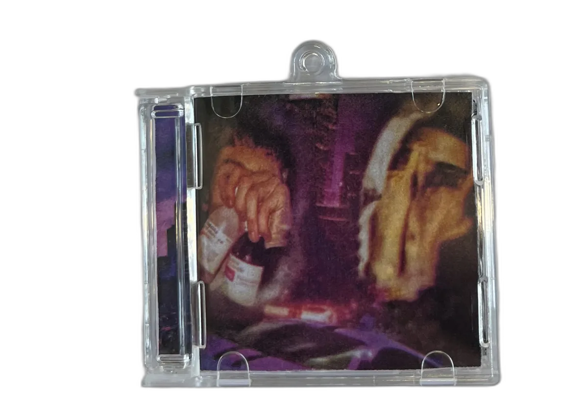 Custom CDMini keychain open showing album art — handmade by CDMinis