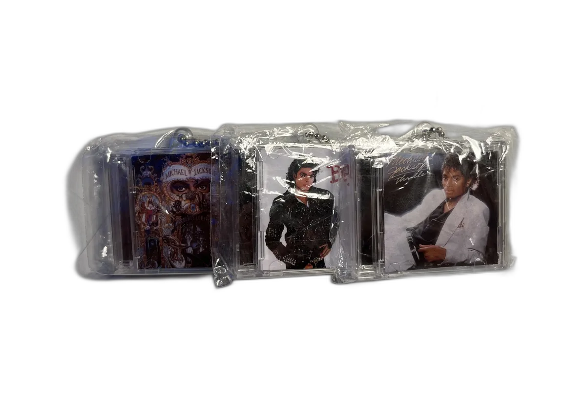 Three Michael Jackson CDMini keychains — Dangerous, Bad, Thriller — CDMinis
